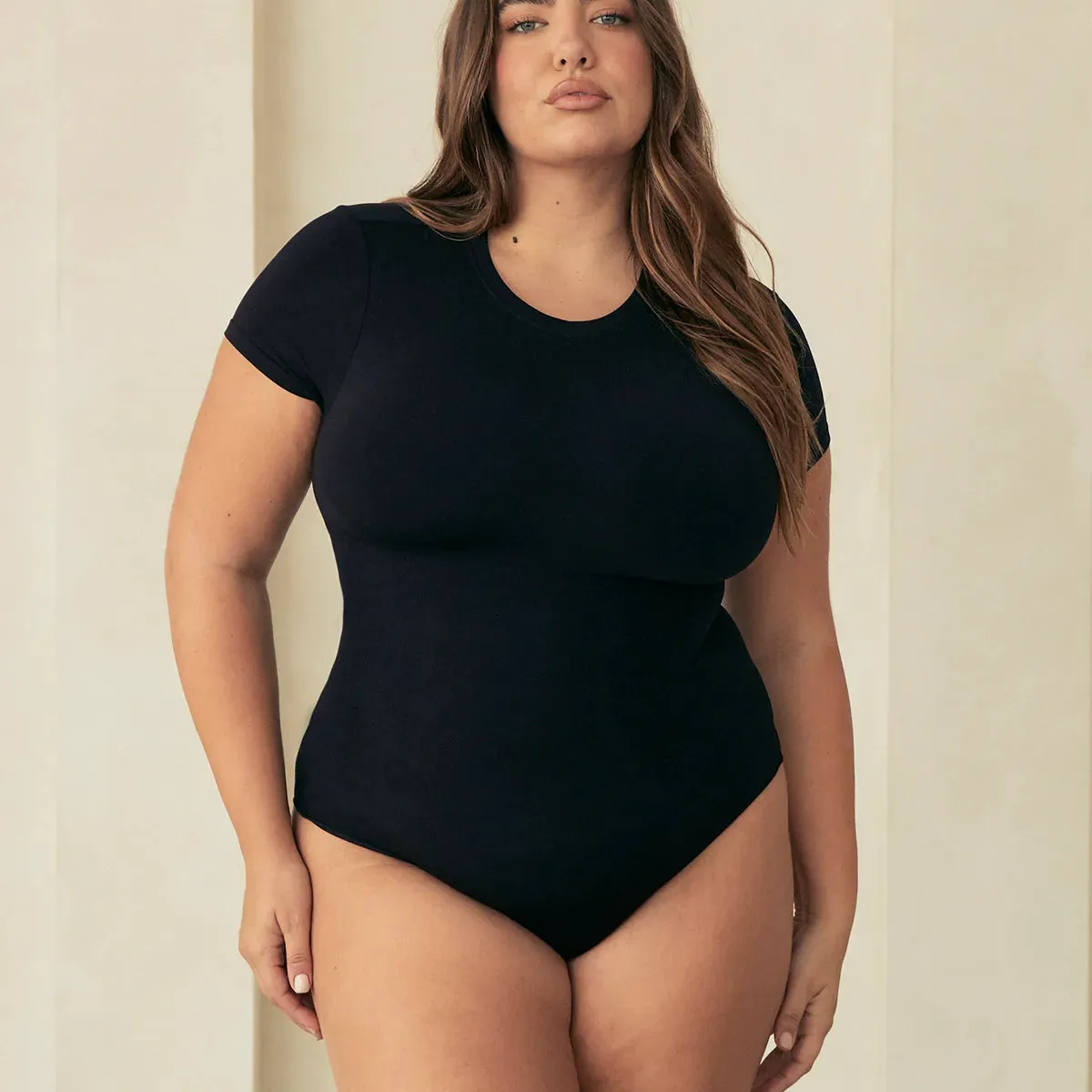 Pinsy Shapewear Short Sleeve Butter Sculpt Seamless Shapewear Bodysuit in Black